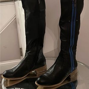 Brand new LUCHINY SIZE 8 black and blue accented boots!!!